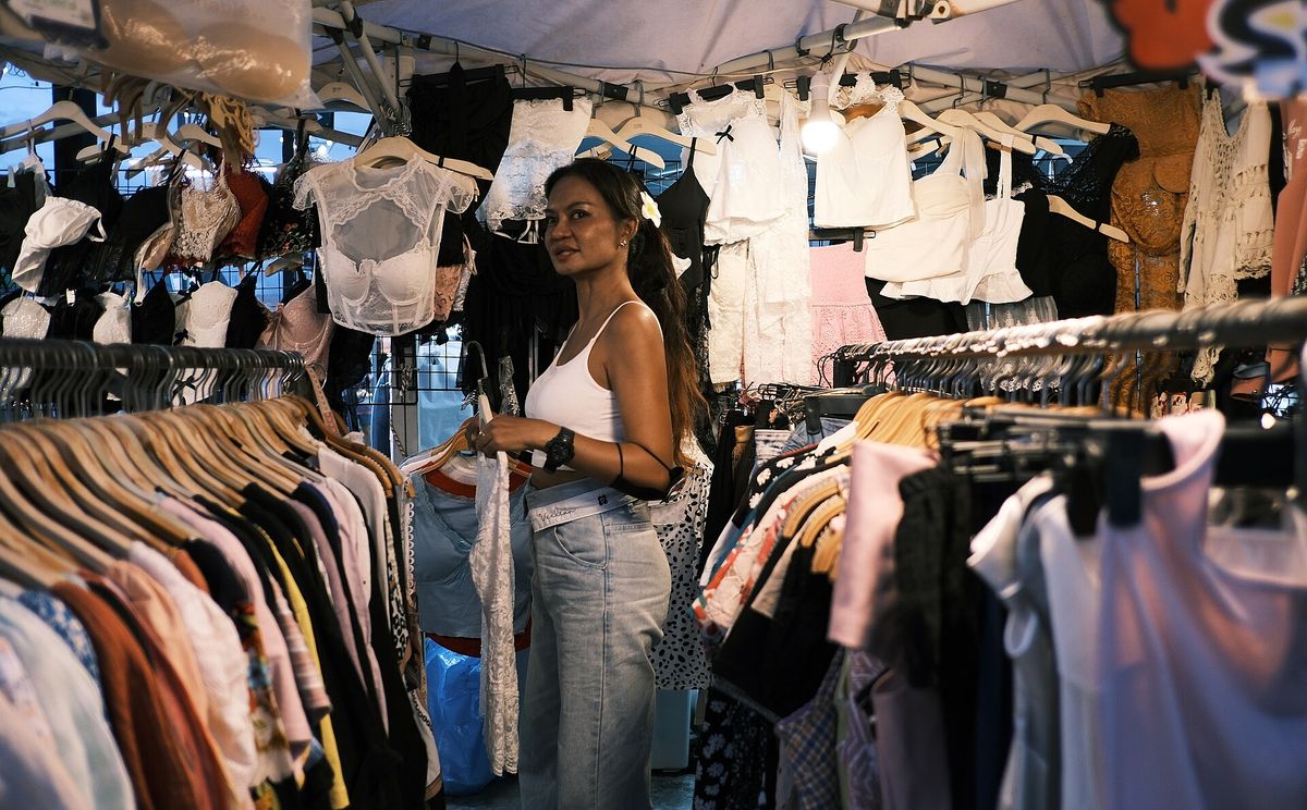 Clothing market stall with garments